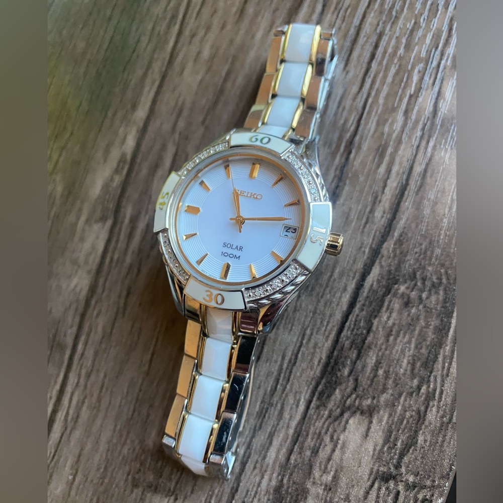Seiko Solar White Dial Stainless Steel and White Ceramic Ladies Watch SNE880